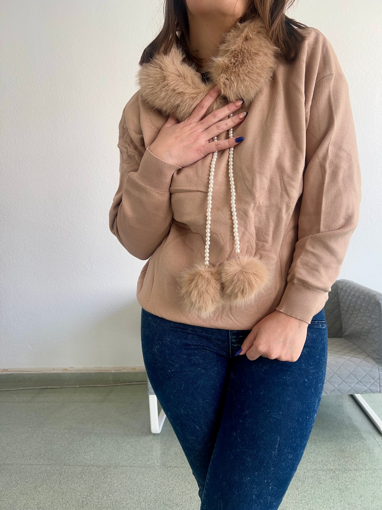 Sudadera pompón