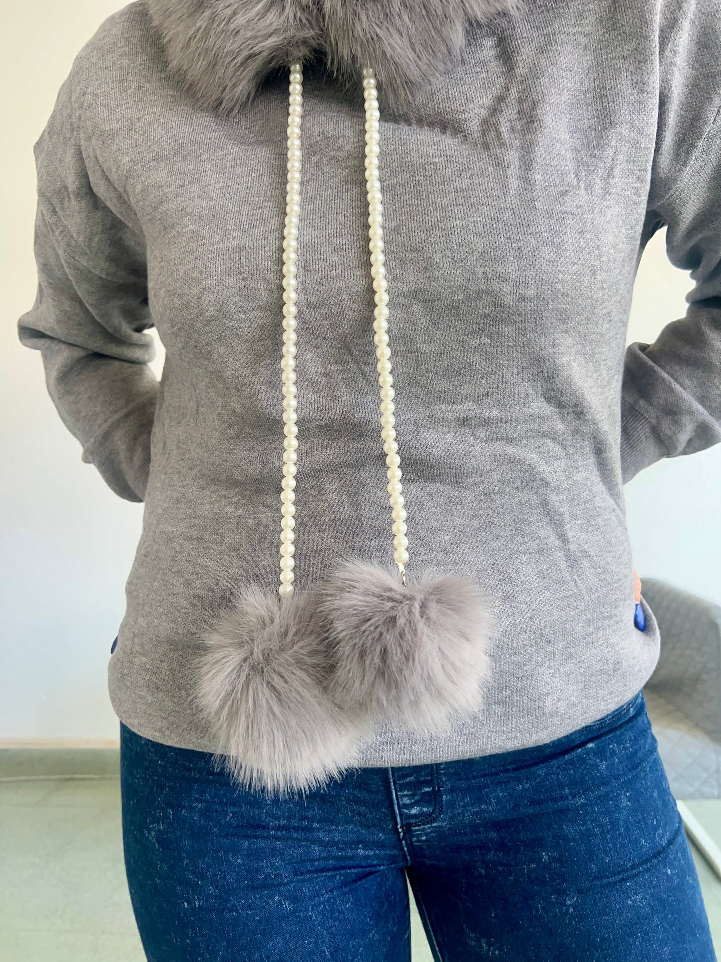 Sudadera pompón