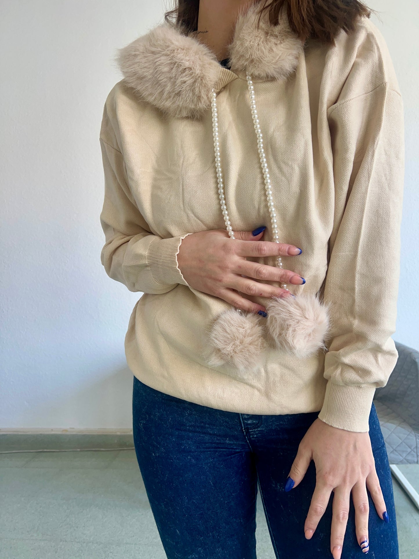 Sudadera pompón