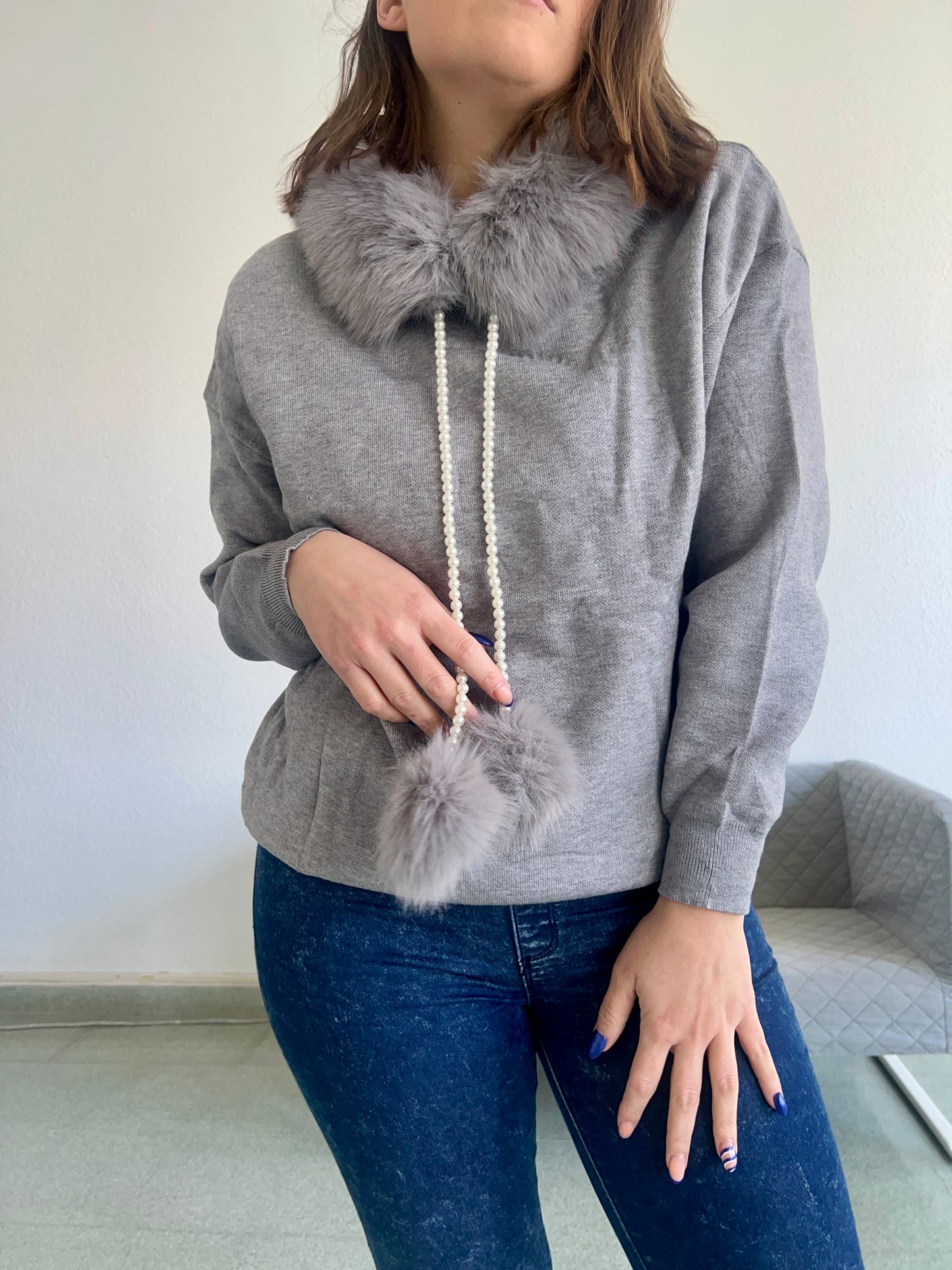 Sudadera pompón